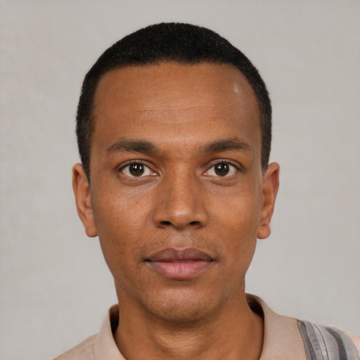 Neutral black young-adult male with short  black hair and brown eyes