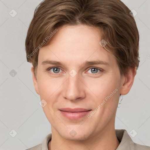 Joyful white young-adult female with short  brown hair and grey eyes