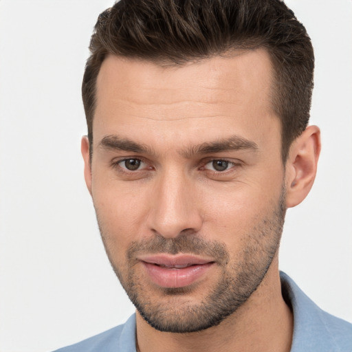 Joyful white young-adult male with short  brown hair and brown eyes