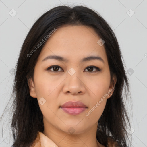 Joyful asian young-adult female with long  brown hair and brown eyes