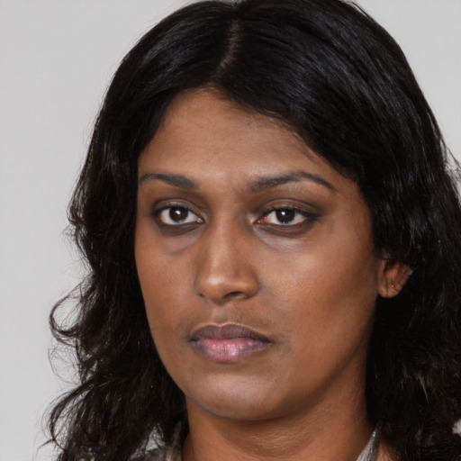 Neutral asian young-adult female with long  black hair and brown eyes