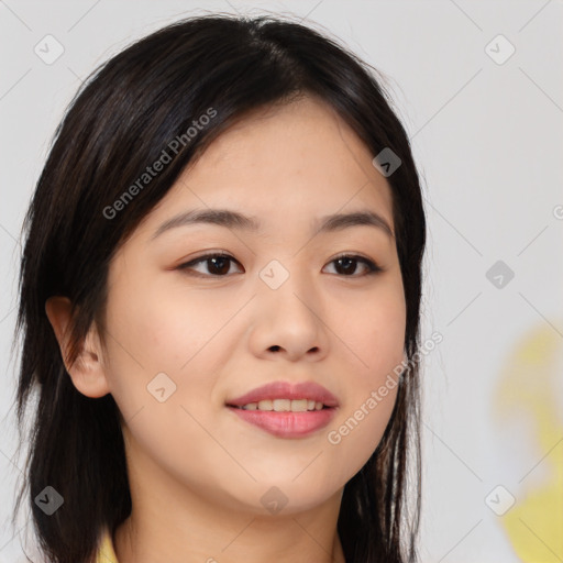 Joyful asian young-adult female with long  brown hair and brown eyes