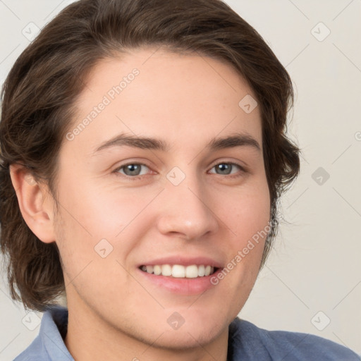 Joyful white young-adult male with medium  brown hair and brown eyes