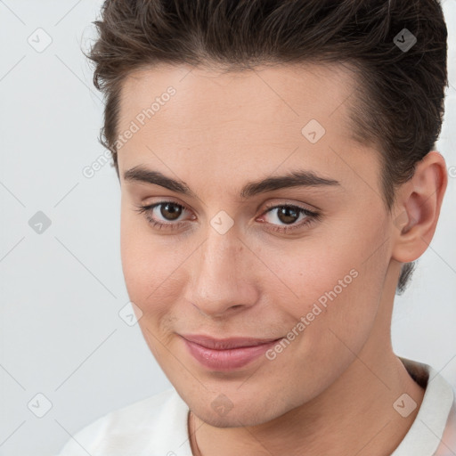 Joyful white young-adult female with short  brown hair and brown eyes