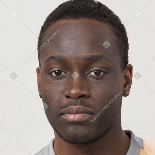 Neutral black young-adult male with short  brown hair and brown eyes