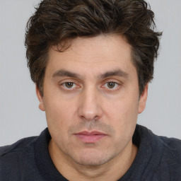 Neutral white adult male with short  brown hair and brown eyes