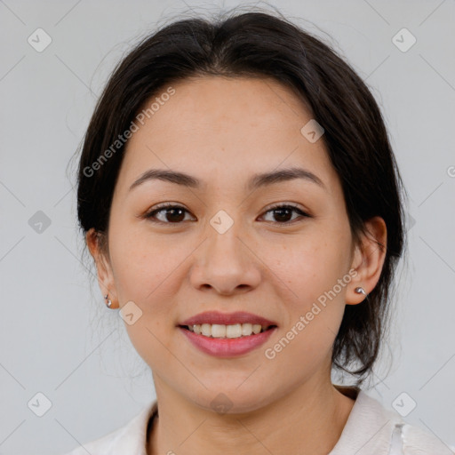 Joyful asian young-adult female with medium  brown hair and brown eyes