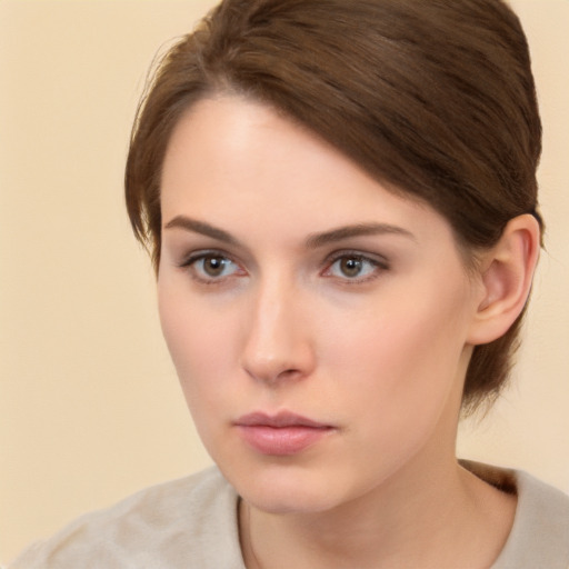 Neutral white young-adult female with medium  brown hair and brown eyes