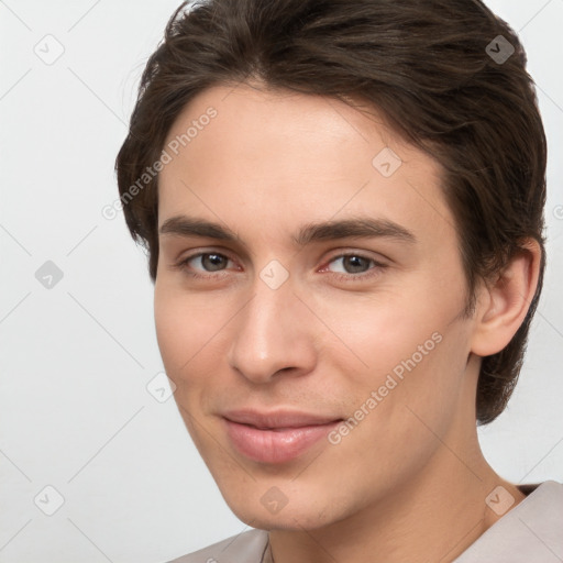 Joyful white young-adult male with medium  brown hair and brown eyes