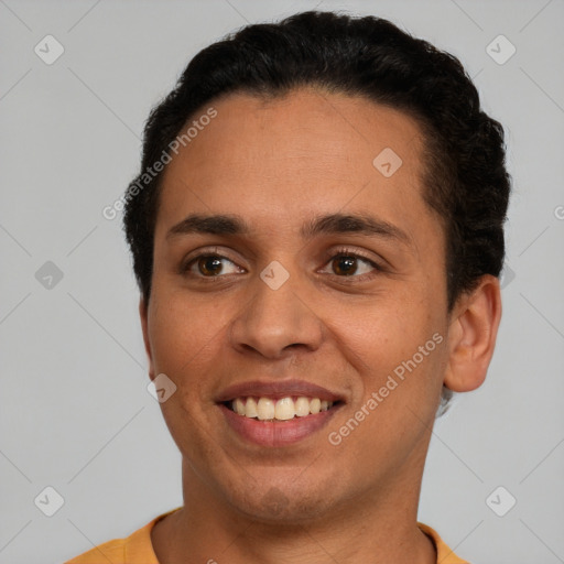 Joyful latino young-adult female with short  brown hair and brown eyes