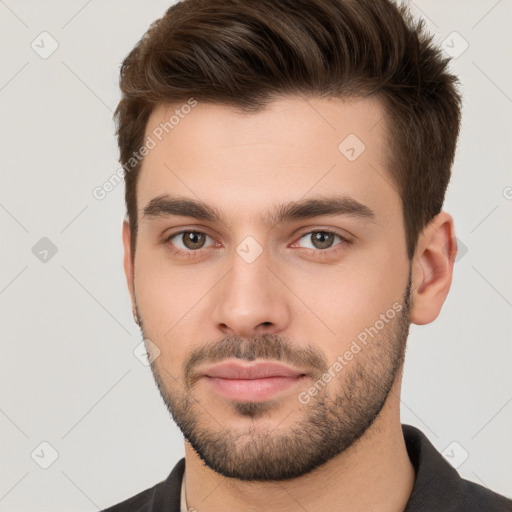 Neutral white young-adult male with short  brown hair and brown eyes