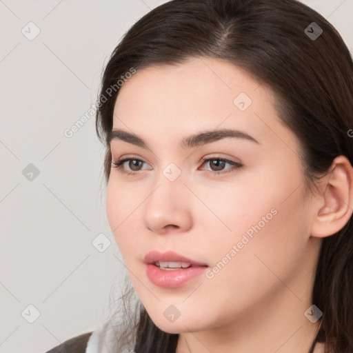 Neutral white young-adult female with long  brown hair and brown eyes