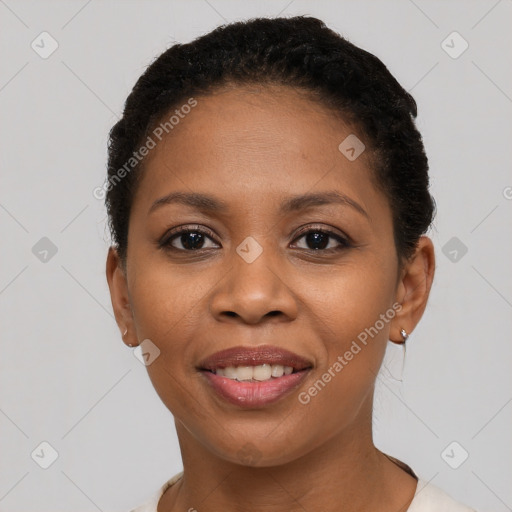 Joyful latino young-adult female with short  brown hair and brown eyes