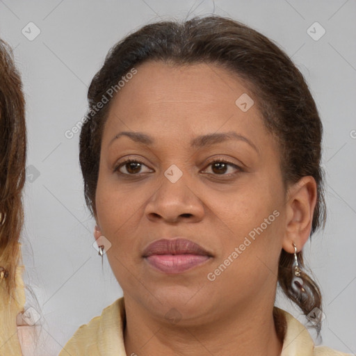 Joyful white adult female with medium  brown hair and brown eyes