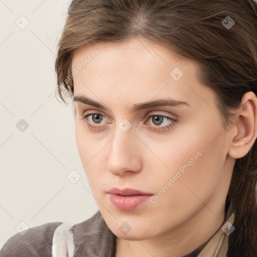 Neutral white young-adult female with medium  brown hair and grey eyes