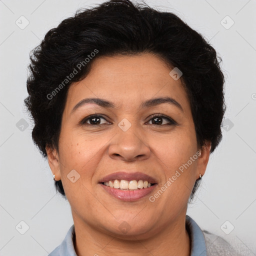 Joyful latino adult female with short  brown hair and brown eyes