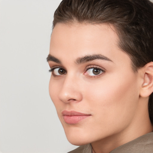 Neutral white young-adult female with short  brown hair and brown eyes