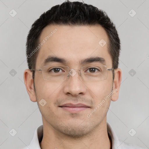 Joyful white young-adult male with short  black hair and brown eyes