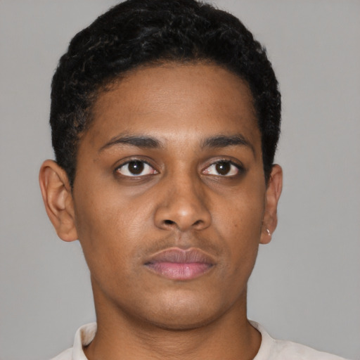 Neutral black young-adult male with short  brown hair and brown eyes