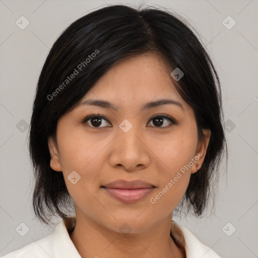 Joyful asian young-adult female with medium  brown hair and brown eyes