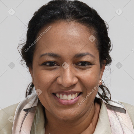 Joyful latino adult female with short  brown hair and brown eyes