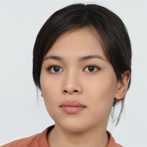 Neutral asian young-adult female with medium  black hair and brown eyes