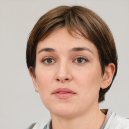 Neutral white young-adult female with short  brown hair and brown eyes