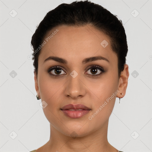 Joyful white young-adult female with short  brown hair and brown eyes