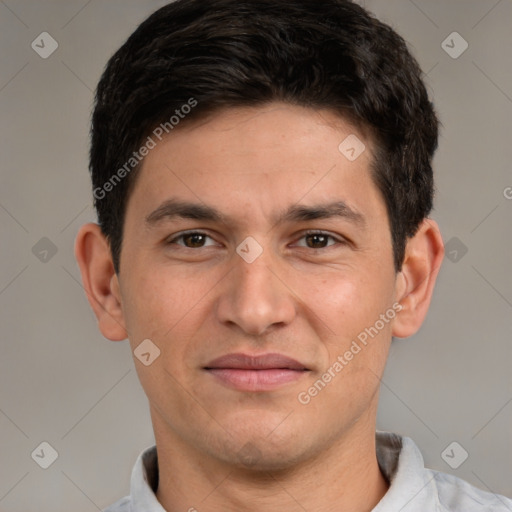 Joyful white adult male with short  brown hair and brown eyes