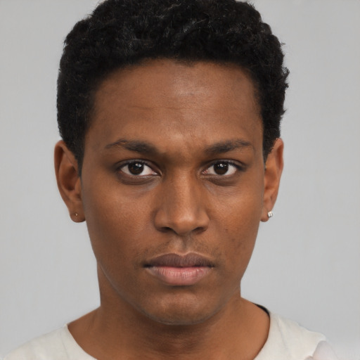 Neutral black young-adult male with short  black hair and brown eyes