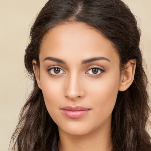 Neutral white young-adult female with long  brown hair and brown eyes