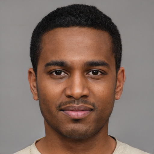 Neutral black young-adult male with short  black hair and brown eyes