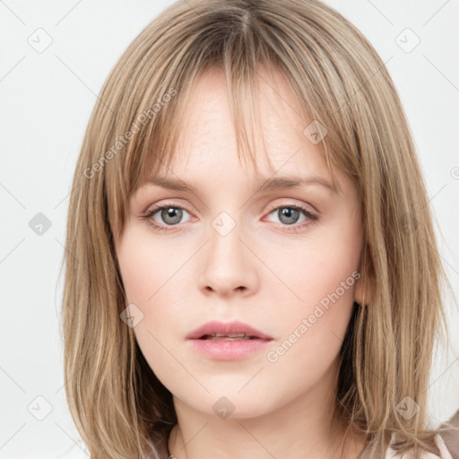 Neutral white young-adult female with medium  brown hair and grey eyes