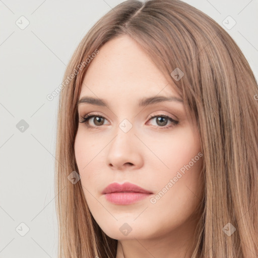 Neutral white young-adult female with long  brown hair and brown eyes