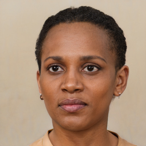 Neutral black young-adult female with short  black hair and brown eyes