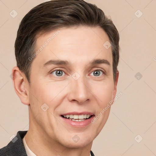 Joyful white adult male with short  brown hair and grey eyes