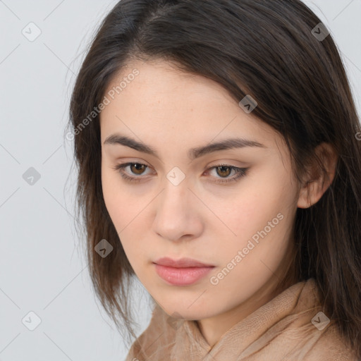 Neutral white young-adult female with long  brown hair and brown eyes