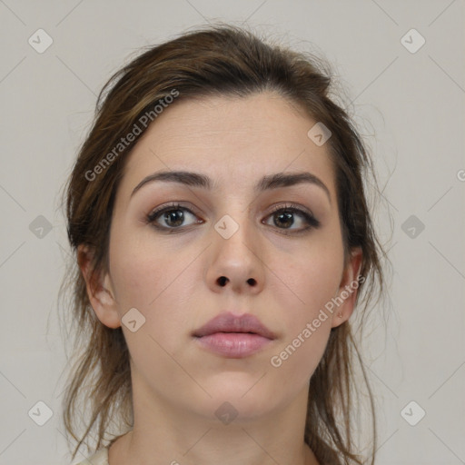 Neutral white young-adult female with medium  brown hair and brown eyes