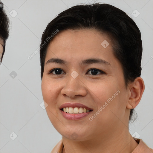 Joyful white young-adult female with medium  brown hair and brown eyes