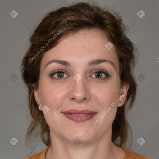 Joyful white young-adult female with medium  brown hair and blue eyes