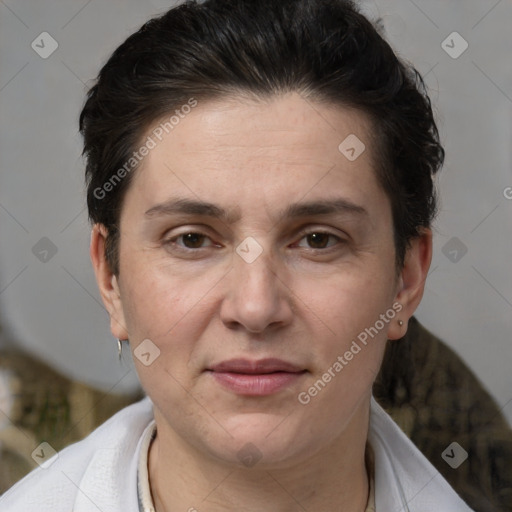 Joyful white adult female with short  brown hair and brown eyes