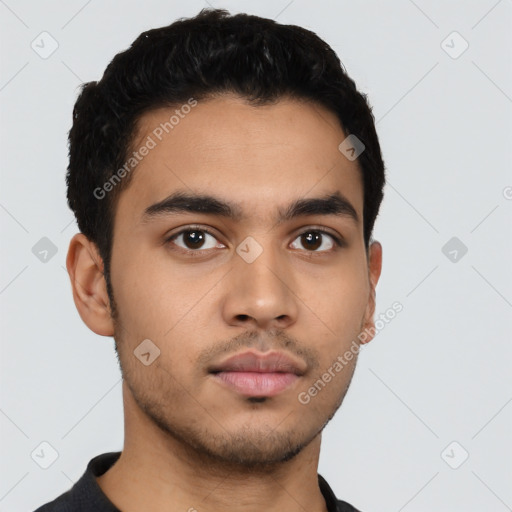 Neutral latino young-adult male with short  black hair and brown eyes