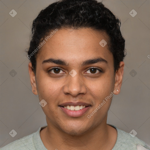 Joyful latino young-adult male with short  brown hair and brown eyes