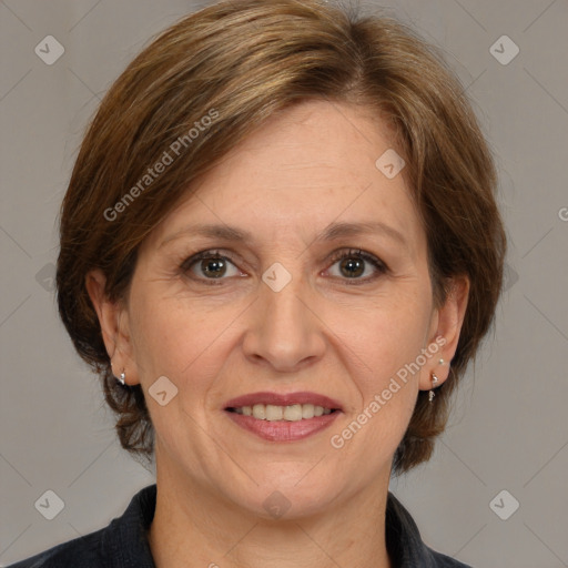 Joyful white adult female with medium  brown hair and grey eyes