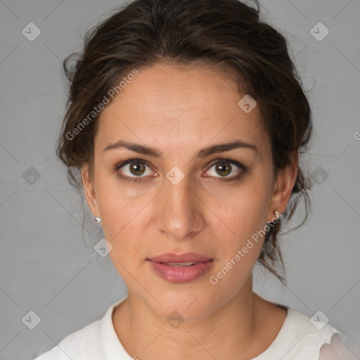 Joyful white adult female with medium  brown hair and brown eyes