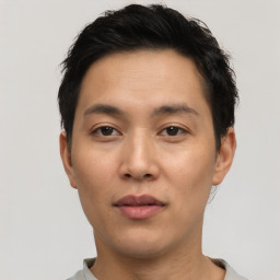 Neutral asian young-adult male with short  black hair and brown eyes