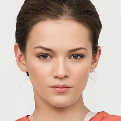 Neutral white young-adult female with medium  brown hair and brown eyes