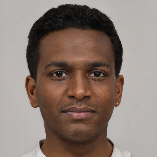 Neutral black young-adult male with short  black hair and brown eyes