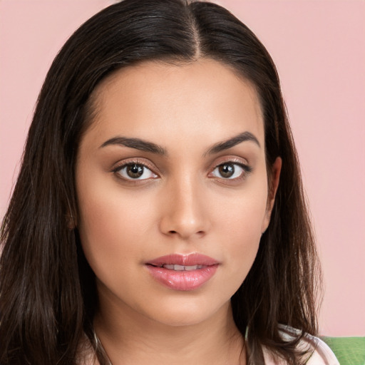 Neutral white young-adult female with long  brown hair and brown eyes