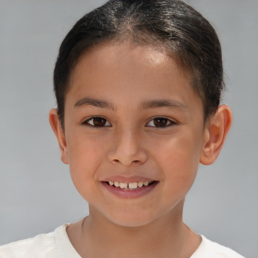 Joyful white child female with short  brown hair and brown eyes